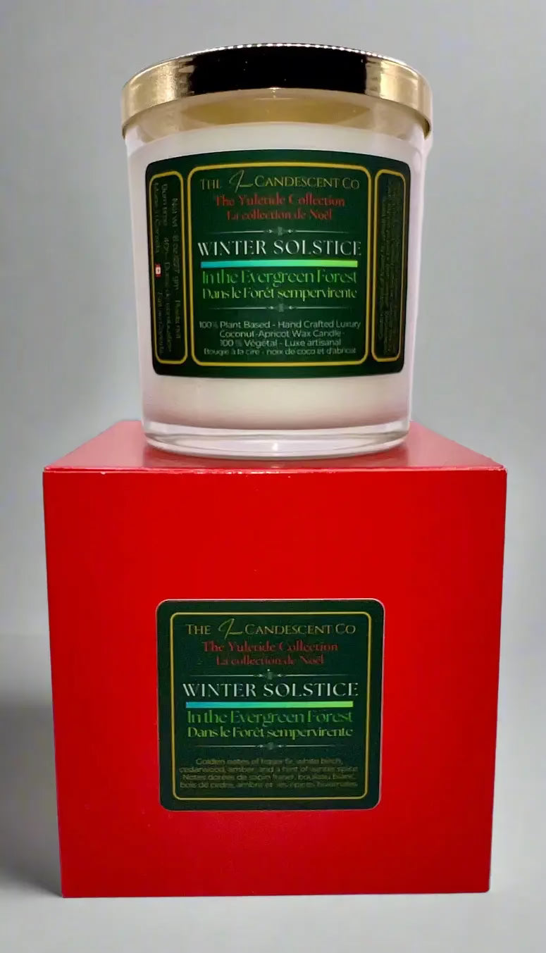 Luxury coconut apricot wax candle by The InnerCandescent Co, featuring a winter woods scent in a tall, elegant candle tower.