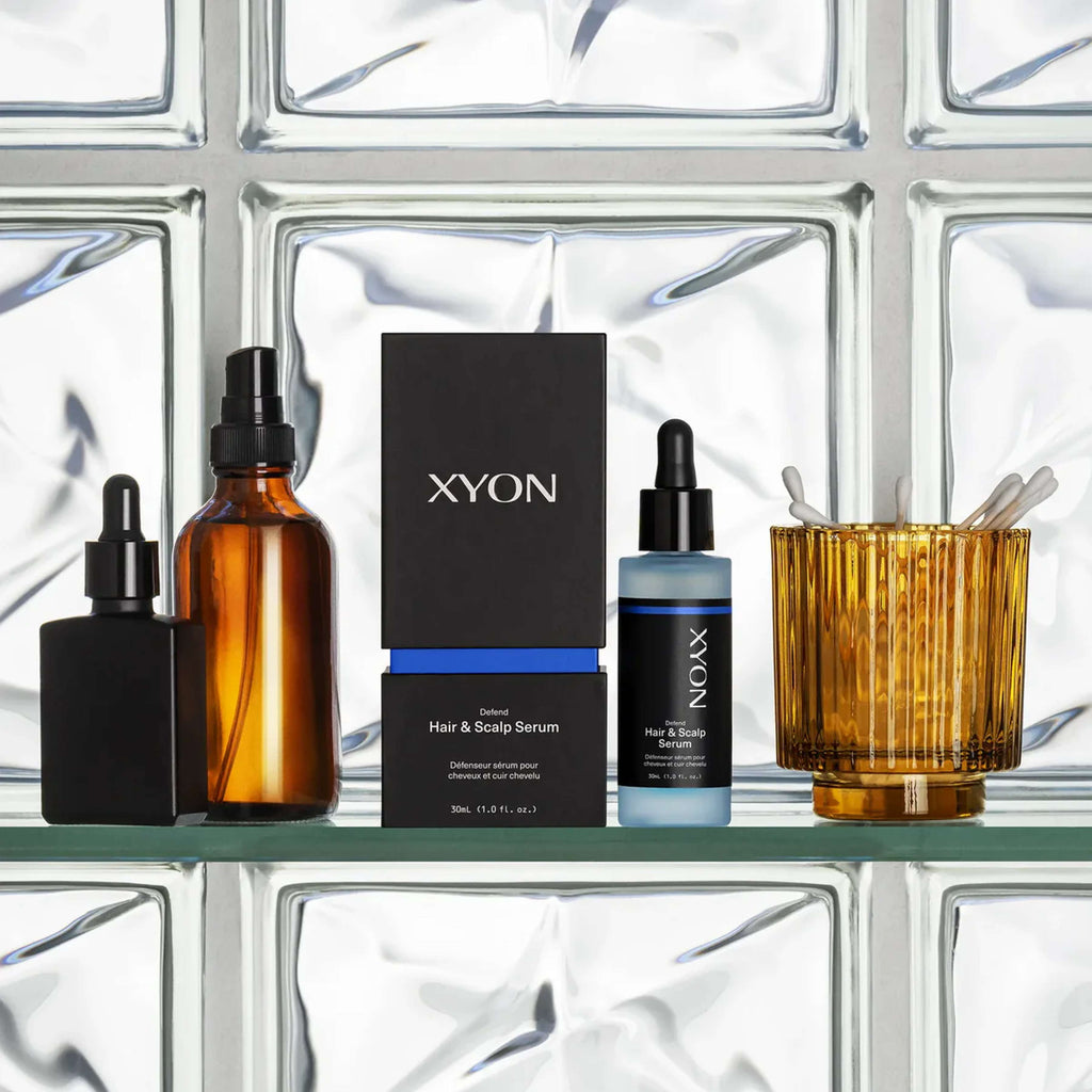 XYON Defend Hair and Scalp Serum for Men, a hair repair treatment showing the serum applicator and product container.