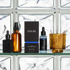 XYON Defend Hair and Scalp Serum for Men, a hair repair treatment showing the serum applicator and product container.