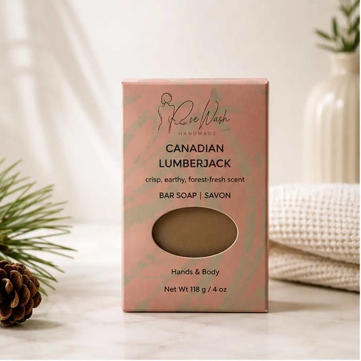 Pure Wash Canadian Lumberjack soap bar for men in a pink rectangular box, beige packaging, natural and rugged grooming product