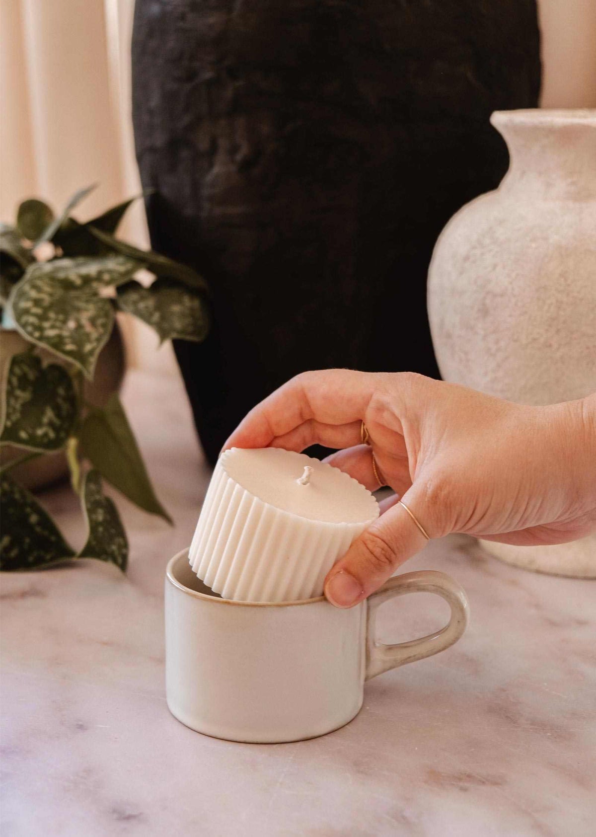 5 oz Topaze candle refill by Mimi & August for home decor, featuring a sleek container and warm, inviting wax inside.