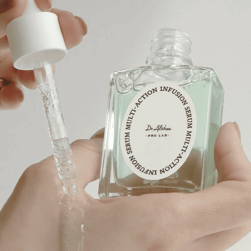 Lakinza K-beauty Dr. Althea Multi-Action Infusion Serum 30ml bottle with dropper applicator on a white background.