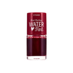 Etude House Dear Darling Water Tint lip makeup in a vibrant shade, showcasing the glossy, watercolor-like finish on lips.
