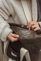 Reversible quilted reusable tote bag by Dans Le Sac, showing its durable fabric and spacious interior for daily use.