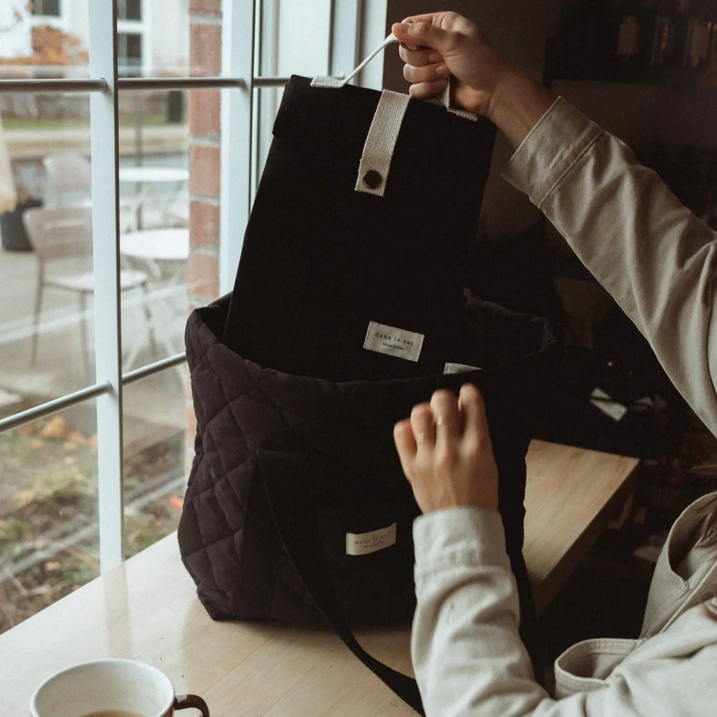 Reusable quilted tote bag by Dans Le Sac, featuring a soft, padded design ideal for everyday use.