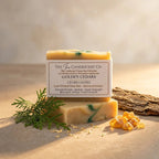 Handmade Golden Cedar soap bar by The InnerCandescent Co with a warm cedar scent, shown in a close-up image.