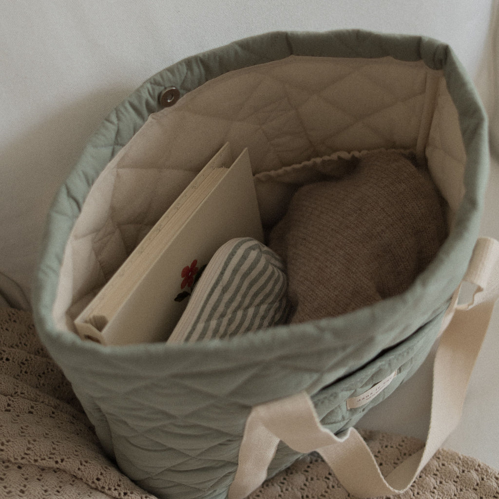 Reutilisable matelassé sac Fourre-tout Dans Le Sac, daily use tote bag with padded design and sturdy handles, in neutral color.