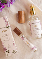 Mimi & August Lilas room spray in 100ml bottle, brown ambiance diffuser with a soft lilac scent, displayed on a neutral background.
