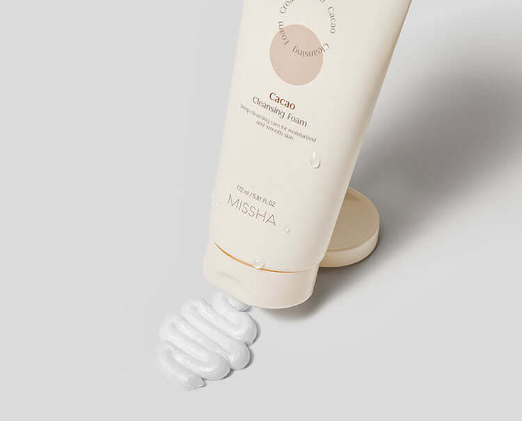 MISSHA Creamy Latte Cleansing Foam 172ml in a white tube, with a soft latte-colored label, designed for gentle facial cleansing.