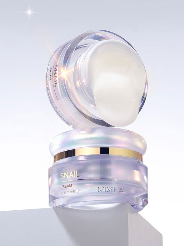 Missha Snail Cream 50ml moisturizer by Lakinza K-beauty, featuring a jar of Korean skincare snail cream with a white lid