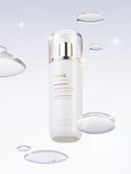 MISSHA Snail Skin Treatment 130ml toner from Lakinza, featuring a clear bottle with a white cap and a label with snail imagery.