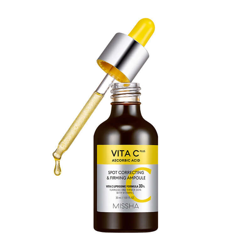 MISSHA Vita C Plus Spot Correcting and Firming Ampoule in a 30ml bottle, featuring brightening and skin-firming ingredients.