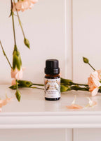 Mimi & August Oiseau du Paradis scented oil bottle with elegant label and floral design, showcasing the scented oil product.