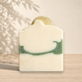 Natural coconut milk soap with lime and eucalyptus scent by La Sultana Savonnerie, featuring fresh lime and eucalyptus leaves.