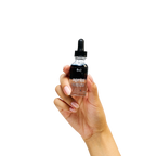 Peach and Cream ® after shave bottle for shaving aftercare, with a sleek design and label featuring the brand logo.