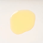 Peach and Cream® shaving primer base with smooth oil texture, designed to prepare skin for a close, comfortable shave.