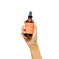 Peach and Cream ® intimate cleanser bottle shown, designed for gentle personal hygiene and freshness.
