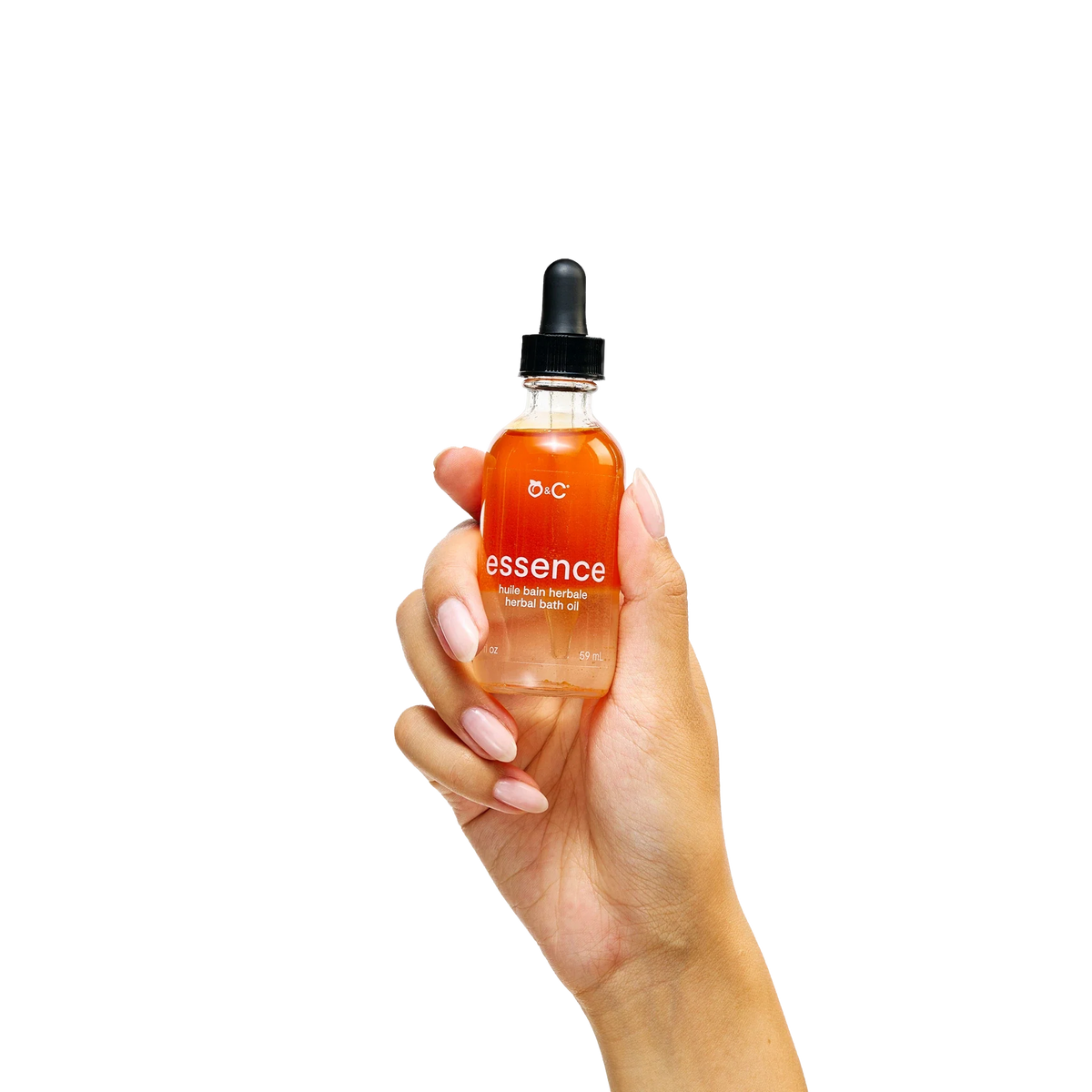 Peach and Cream® restorative body oil bath oil with a clear glass bottle and golden oil, ideal for nourishing skin during bath time.