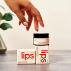 Peach and Cream vulva balm for lips, in a sleek container, with a natural and nourishing appearance, suitable for sensitive skin.