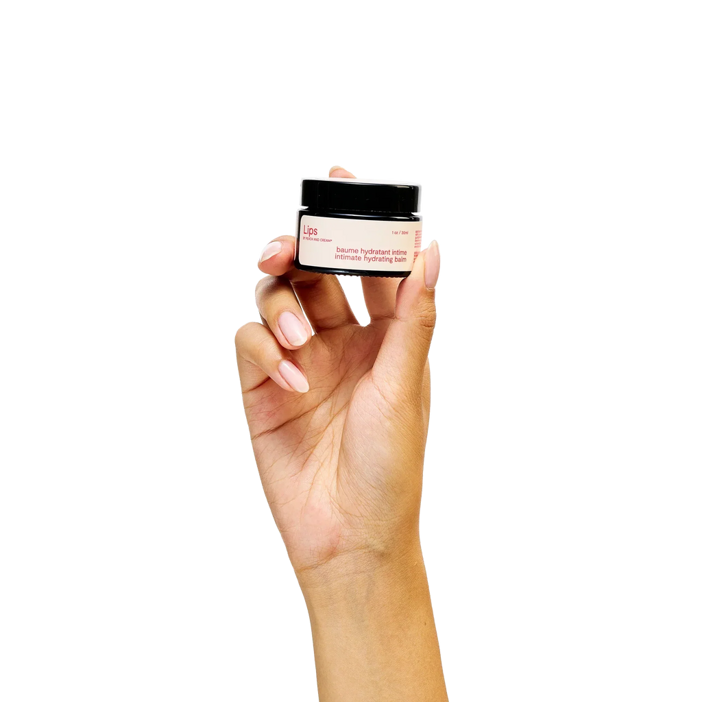 Peach and Cream vulva balm tube featuring natural ingredients, designed to soothe and hydrate intimate lips.