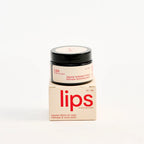 Peach and Cream vulva balm for lips in a compact jar with the product packaging visible.
