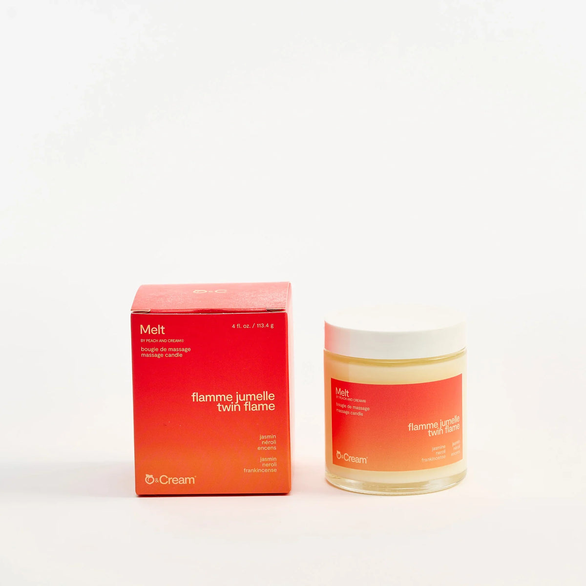 Peach and Cream massage candle melt with a warm, flickering flame and soft wax surface for soothing massage therapy.