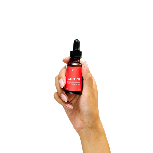 Peach and Cream arousal tonic serum in a sleek bottle, showing the clear gel formula and elegant packaging.