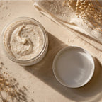 Pure Wash Polish It creamy face scrub in a clear glass jar, showing its smooth exfoliating texture and natural ingredients.