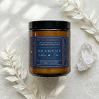 A luxury aqua water element candle by The InnerCandescent Co featuring fresh aquatic, coconut, and apricot wax for a calming ambiance.