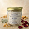 Mineral soak bath salts from The InnerCandescent Co, showing a jar of grounding magnesium and mineral-rich bath salts for foot soaks.