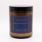 Luminous luxury coconut apricot wax candle from The InnerCandescent Co, showcasing a sleek, elegantly designed candle with a glowing flame.