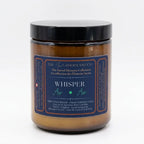 The InnerCandescent Co Whisper Air Element candle with fresh coconut and apricot wax, shown in a sleek, minimalist container.