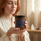 Luminous coconut apricot wax candle from The InnerCandescent Co with elegant glass holder and soft glowing flame.