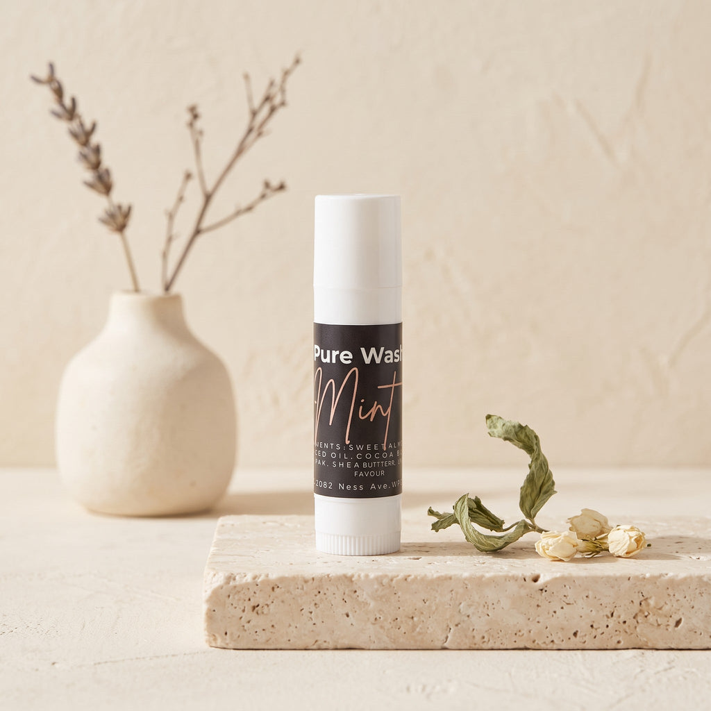 Pure Wash mint lip balm tube showing smooth, refreshing mint-flavored lip balm in a sleek tube.