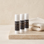Pure Wash mint lip balm tubes showing smooth, natural lip balm with mint flavor in sleek packaging.