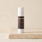 Pure Wash mint lip balm in a small container, featuring a smooth, natural finish and a refreshing mint scent.