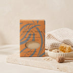 Pure Wash oatmeal milk honey soap bar with a smooth, creamy surface and natural ingredients visible in the image.