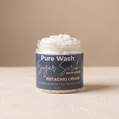 Pure Wash pistachio cream body sugar scrub in a jar, showcasing the creamy texture and natural ingredients for exfoliation and skin softness.