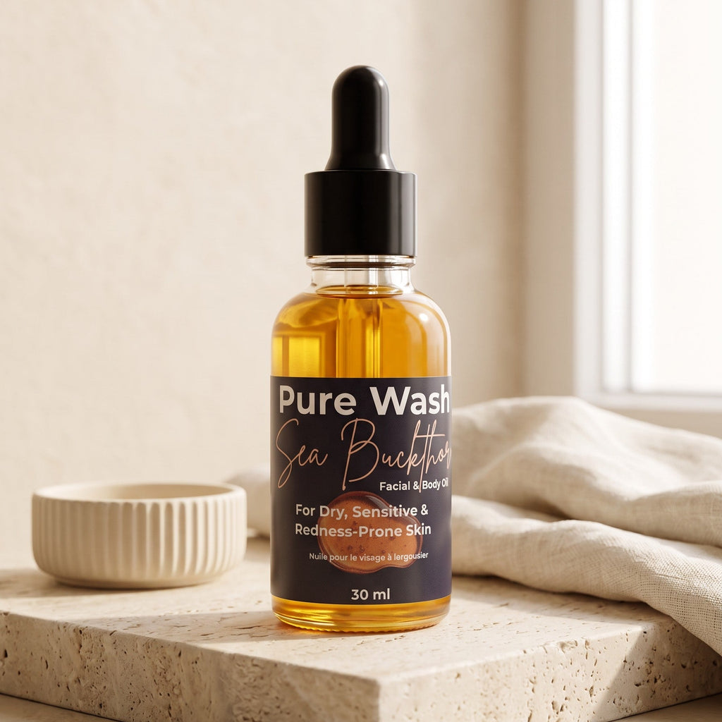 Pure Wash Sea Buckthorn Facial Oil in a glass dropper bottle showing golden oil and fresh sea buckthorn berries, natural skincare product.