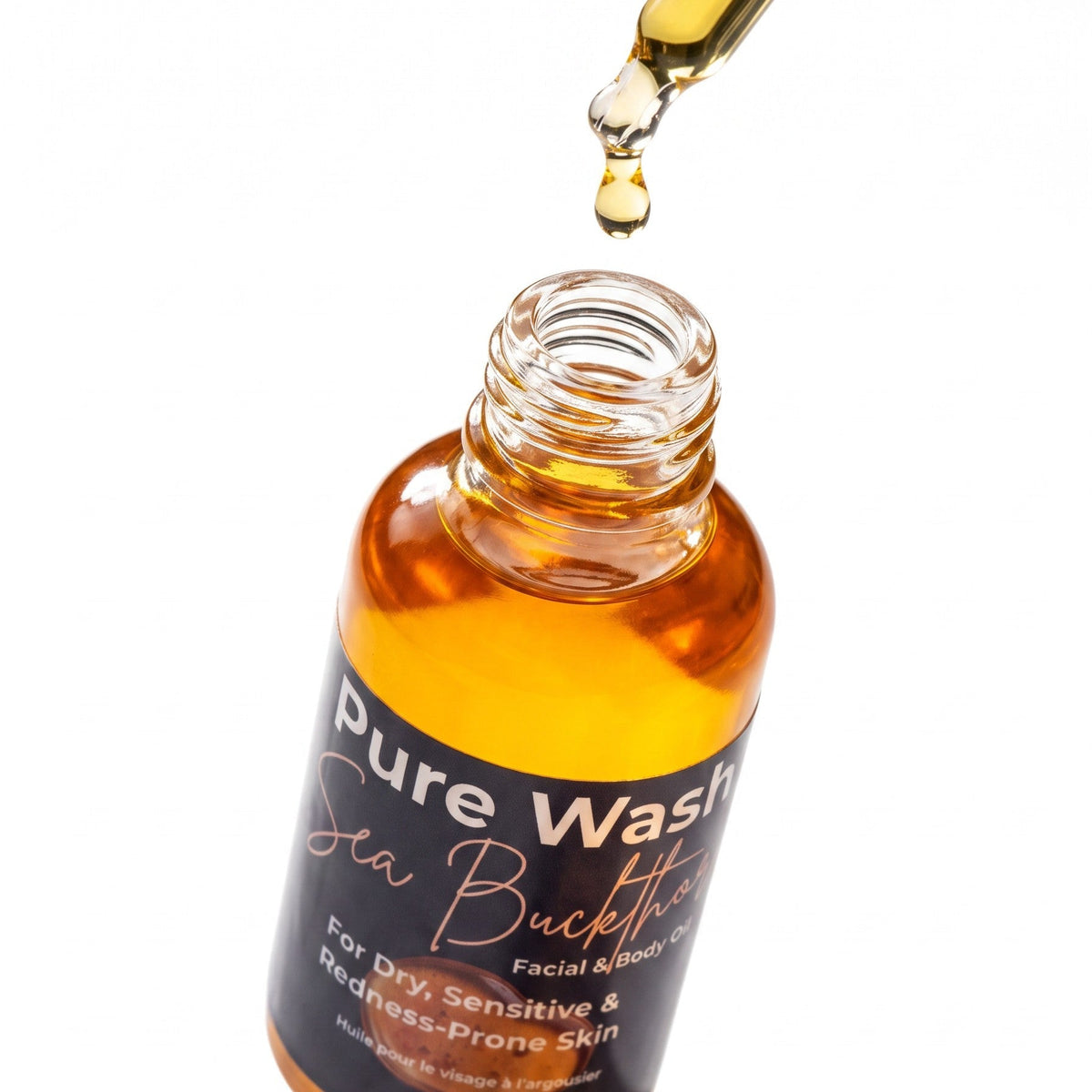 Pure Wash Sea Buckthorn Facial Oil bottle with dropper, showcasing the natural golden color of the nourishing facial oil.