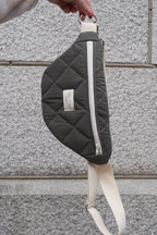 Recycled zippered belt bag from Dans Le Sac with a quilted forest pattern, designed for eco-friendly and stylish storage.