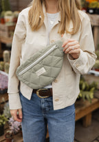 Mint green reusable zippered waist bag from Dans Le Sac, compact design with adjustable strap and secure closure.