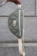 Reusable zippered waist bag from Dans Le Sac in sage green, featuring a compact, practical design for everyday use.