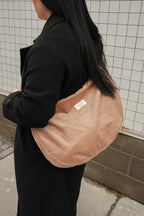 Dune corduroy shoulder bag with adjustable strap and zipper closure, reusable messenger style from Dans Le Sac.