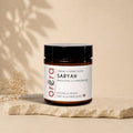 Natural night face cream by La Sultana Savonnerie with bakuchiol and cranberry for skincare, in a white jar with a green label.