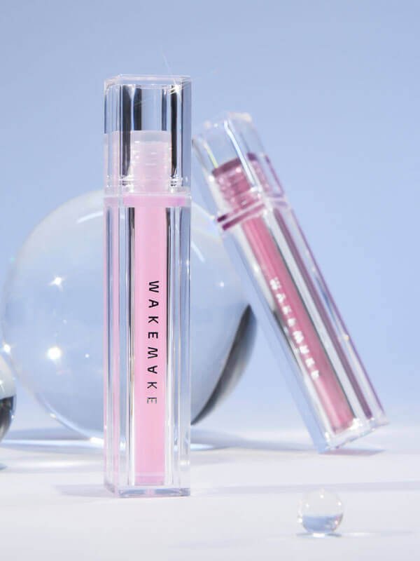 Lakinza WAKEMAKE Dewy Gel Glow Tint lip makeup in 3g tube, showcasing a glossy, dewy finish on the lips.