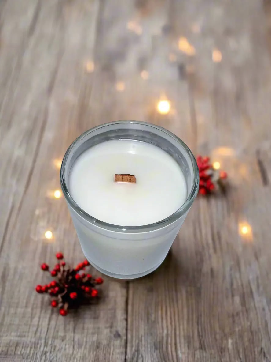 Close-up of the wick of The InnerCandescent Co Sacred Hearth Christmas luxury coconut apricot wax candle.