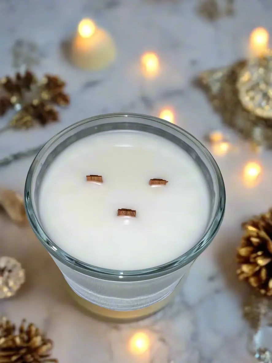 Triple wood wick candle from The InnerCandescent Co featuring warm spiced Christmas scent with coconut and apricot wax.